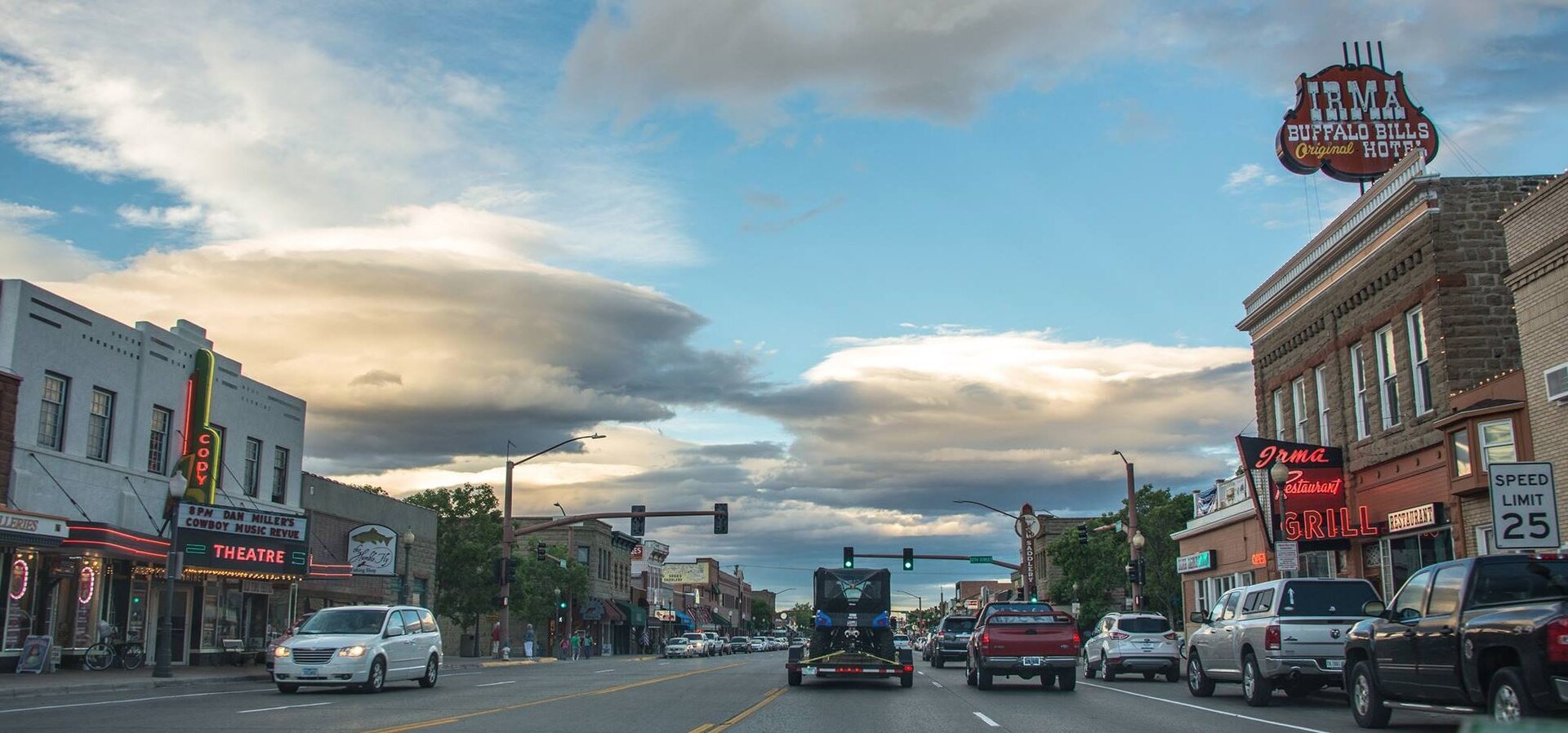 The Irma Hotel in downtown Cody, Wyoming, with its three-story sandstone front and original cherrywood bar advertised on the facade.